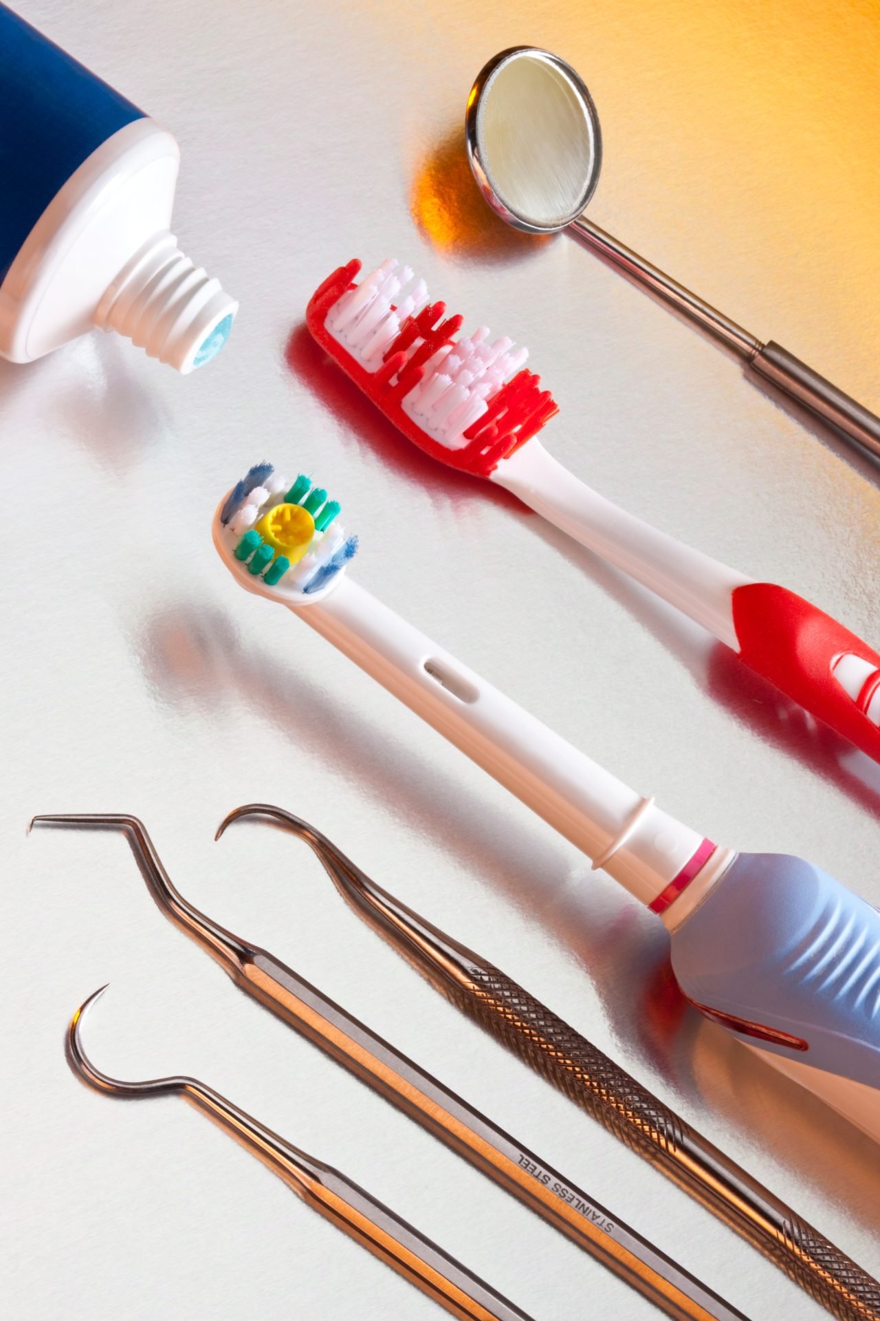 Redlemon Dental Hygiene Tools On Reflective Surface 2026 03 24 01 28 51 Utc Compressed