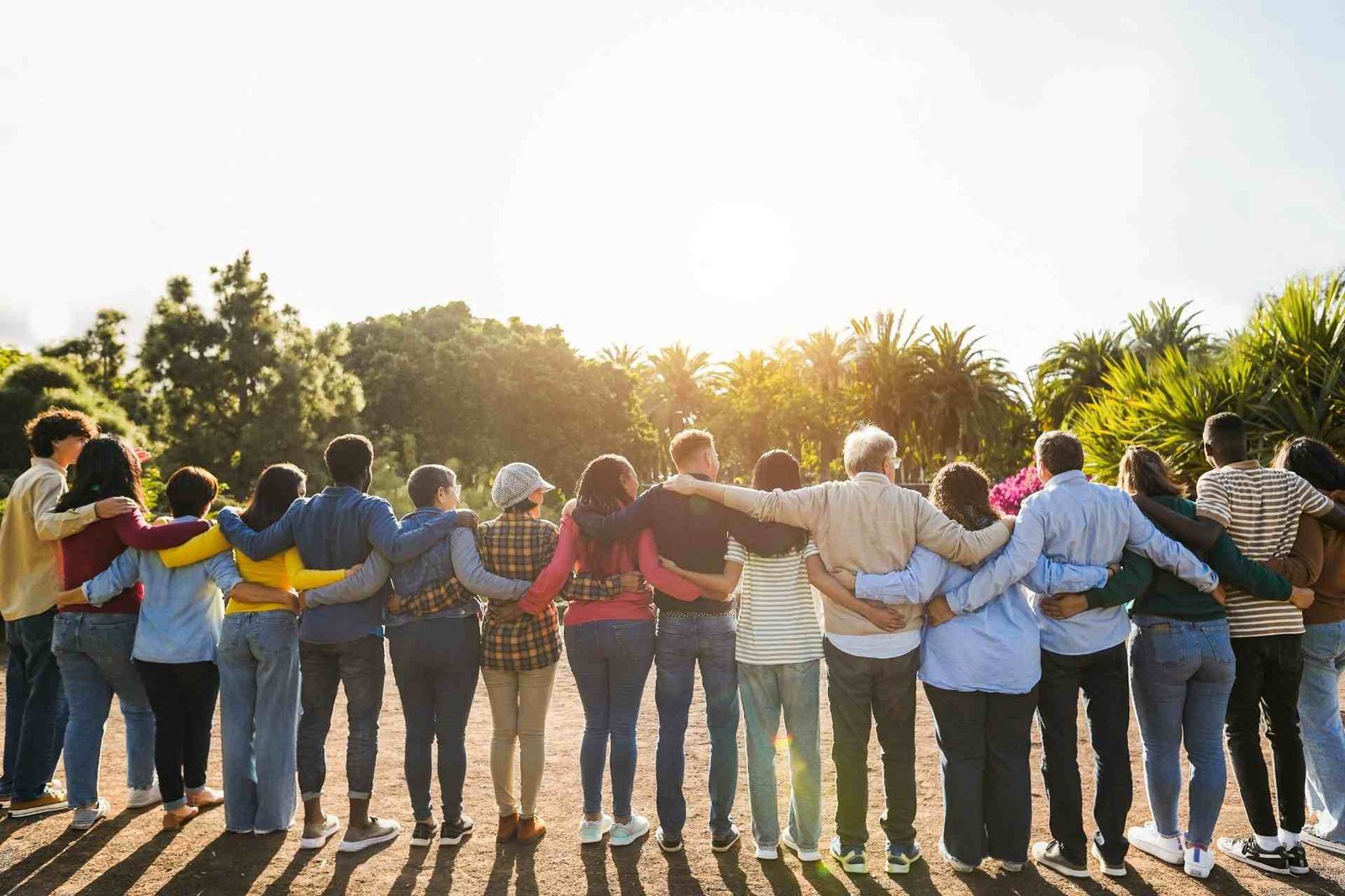 Redlemon Group Of People Embracing In Park Back View 2026 01 11 08 11 01 Utc Compressed