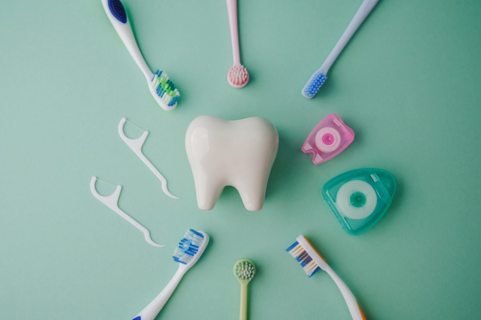 Redlemon Large Tooth Model Surrounded By Toothbrushes And D 2026 03 24 01 26 41 Utc Compressed