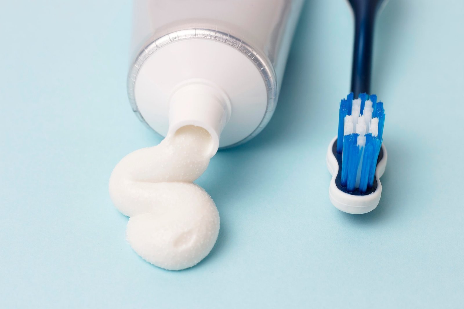 Redlemon Toothpaste In Tube And Toothbrush On Blue Backgrou 2026 03 17 06 52 56 Utc Compressed