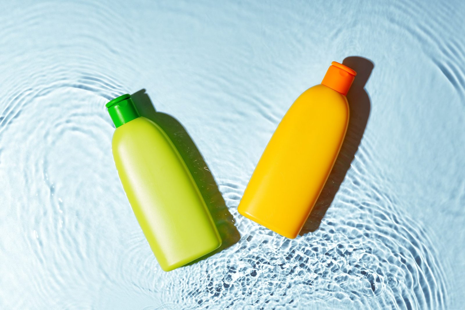 Redlemon Two Colorful Bottles Floating In Water 2026 03 19 05 14 36 Utc Compressed