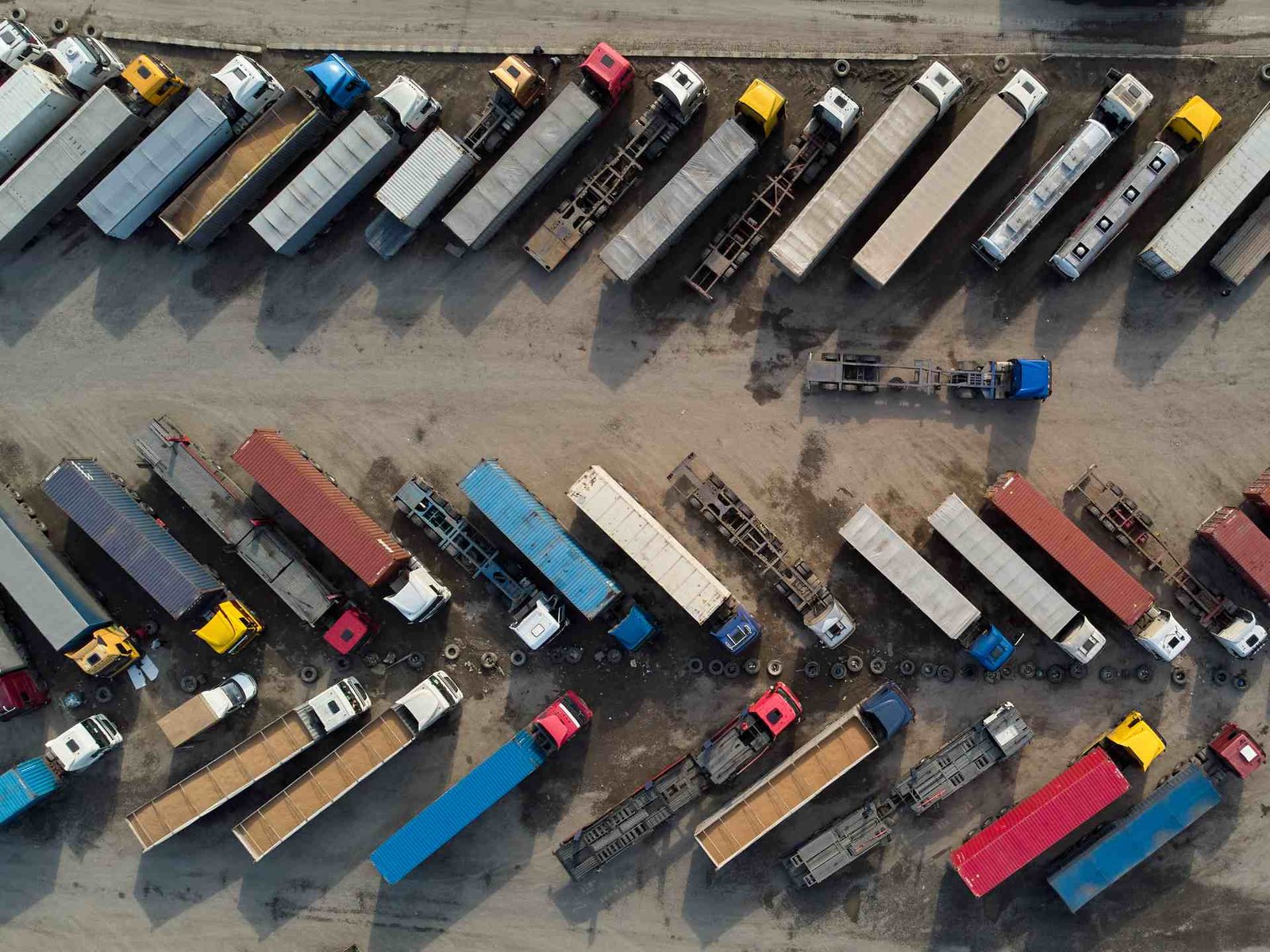 Aerial View Of A Parking Lot Of Trucks Ready For L 2026 03 24 04 32 24 Utc